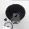 An overhead view of the interior of a black coffee frother with its accessories disassembled. Náhľad obrázku produktu