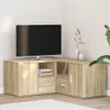 A corner TV stand with a television on top, placed in a room setting. Voir les images du produit