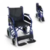A blue foldable wheelchair is shown against a white background. A smaller, folded version of the wheelchair is visible in the background. Anteprima dell’immagine prodotto