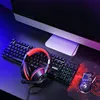 A gaming setup with a monitor, keyboard, mouse, and headphones on a desk. Náhled obrázku produktu