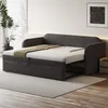 A gray upholstered daybed is shown in a room with blinds and a plant. Anteprima dell’immagine prodotto