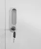 Close-up of a lock and key on a white cabinet door. Anteprima dell’immagine prodotto