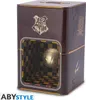 A Harry Potter themed money box shaped like a Golden Snitch, with a clear window showing the Snitch inside. Anteprima dell’immagine prodotto