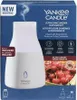 The image shows the packaging of a Yankee Candle ultrasonic aroma diffuser kit, featuring the product itself and promotional graphics. Produktbild-Vorschau