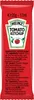 A single sachet of Heinz Tomato Ketchup against a white background. Anteprima dell’immagine prodotto