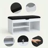 A white shoe cabinet with a black upholstered seat and multiple storage compartments, shown with close-up insets highlighting details. Náhľad obrázku produktu
