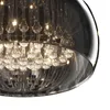 A close-up view of a modern chandelier with multiple glass droplets. Produktbild-Vorschau