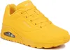 A bright yellow Skechers sneaker is shown from a side angle against a white background. Voir les images du produit