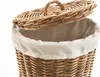 A close-up shot of a wicker laundry basket with a lid. Produktbild-Vorschau