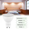 A bedroom scene with lighting, and a close-up of an LED bulb with product specifications. Produktbild-Vorschau