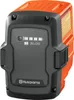 A close-up studio shot of a Husqvarna battery pack. Podgląd zdjęcia produktu