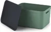 A green storage box with a dark gray lid is shown with the lid slightly ajar. Produktbild-Vorschau
