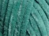 A close-up, textured view of teal yarn. Produktbild-Vorschau