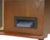 A close-up view of a cassette tape inserted into a slot on a wooden stereo system. Náhled obrázku produktu