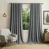 A living room scene with a chair, curtains, and a window. Produktbild-Vorschau