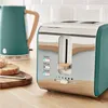 A teal toaster and kettle are on a wooden countertop, with toast on a wooden board. Podgląd zdjęcia produktu