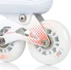 A close-up view of the wheels and frame of a white inline skate with orange accents. Anteprima dell’immagine prodotto
