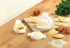 A set of pastry makers with ingredients laid out on a wooden table. Produktbild-Vorschau