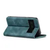 A teal flip case for a Google Pixel 7a, shown from a side-angle with the case open and propped up. Produktbild-Vorschau
