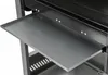 A close-up view of a metal shelf on a grill. Náhled obrázku produktu