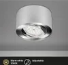 A close-up, studio shot of a silver LED ceiling light mounted on a light gray ceiling. Voir les images du produit