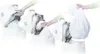 A sequence of images showing how to remove a full bag from a diaper disposal system. Produktbild-Vorschau