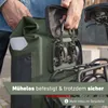 A person is attaching a green bicycle pannier bag to a bicycle rack. Produktbild-Vorschau