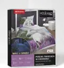 The image shows the packaging of a bedding set with a horse and lavender design. The packaging is displayed at an angle, with the front and side visible. There is a smaller inset image on the side of the packaging that shows the bedding glowing in the dark Náhled obrázku produktu