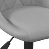A close-up view of a gray upholstered chair seat and armrest. Produktbild-Vorschau