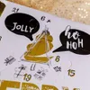 A close-up view of an open advent calendar with decorative elements and text. Produktbild-Vorschau