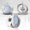 Three views of a round, ultra-thin LED recessed spotlight with a brushed metal finish and blue LEDs. Voir les images du produit