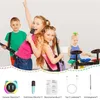 Children playing with musical instruments and a karaoke machine. Produktbild-Vorschau
