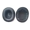 Two black ear pads for headphones are shown against a white background. One ear pad has an 'L' marking. Náhled obrázku produktu