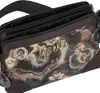 A close-up shot of a handbag with a floral pattern. Anteprima dell’immagine prodotto