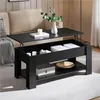 A black lift-top coffee table is shown in a living room setting, with a sofa in the background. Produktbild-Vorschau