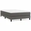 A studio shot of a bed frame with a mattress on top, against a white background. Voir les images du produit