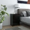 A bedroom scene with a nightstand, lamp, and plant. Náhled obrázku produktu