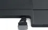 A close-up view of a black electronic component with a bundle of wires and a connector. Produktbild-Vorschau