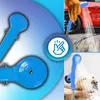 Collage showing a blue camping shower being used to wash a car and a dog, with a graphic indicating ease of use. Produktbild-Vorschau