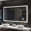 A modern bathroom with a large illuminated mirror, two sinks, and a towel warmer. Produktbild-Vorschau