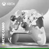 A close-up, angled view of an Xbox controller with an arctic camouflage pattern. Náhľad obrázku produktu