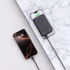Two smartphones are shown, one charging wirelessly with a power bank, the other plugged in via cable. Náhľad obrázku produktu
