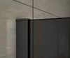 A close-up view of a black metal post and a dark glass panel, likely part of a shower enclosure, against a tiled wall. Produktbild-Vorschau