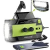 A survival radio with a flashlight and solar panel is shown, with a smartphone connected and charging. Produktbild-Vorschau