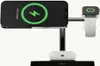 A black Belkin 3-in-1 MagSafe wireless charging stand with a phone, Apple Watch, and AirPods charging. Produktbild-Vorschau