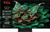 A TCL television displaying a vibrant, abstract image of a green, jewel-encrusted butterfly-like design. Produktbild-Vorschau