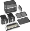 An air fryer and its accessories are laid out on a white background. Produktbild-Vorschau