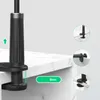 A close-up of a black clamp-style holder attached to a white marble countertop, with inset images showing different mounting options. Podgląd zdjęcia produktu