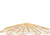 A hanging lamp with a woven, leaf-like shade. Produktbild-Vorschau