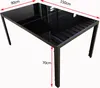 A black glass-topped dining table with a metal frame, shown from a diagonal angle with dimensions indicated by red arrows and text. Produktbild-Vorschau